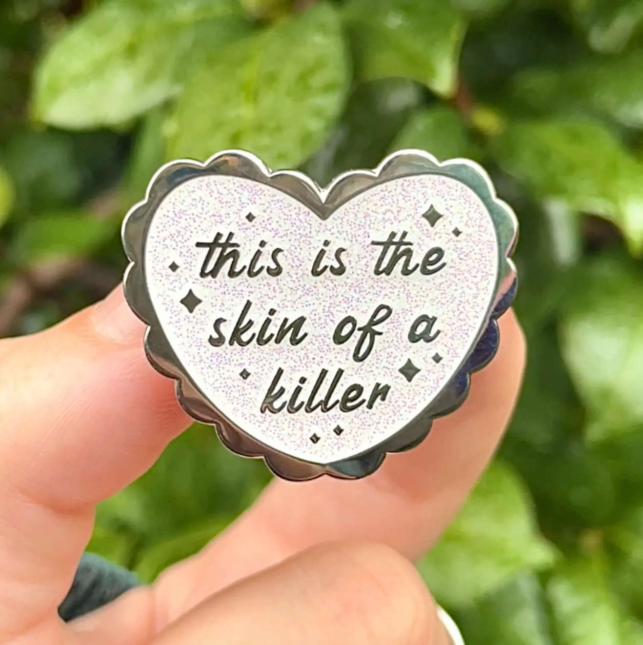 This is the Skin of a Killer Glitter Enamel Pin